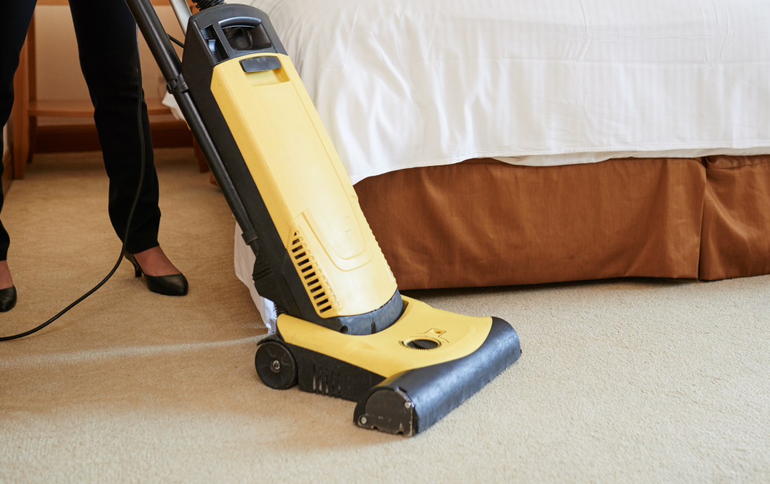 vacuum cleaning a carpet in bedford for a private client